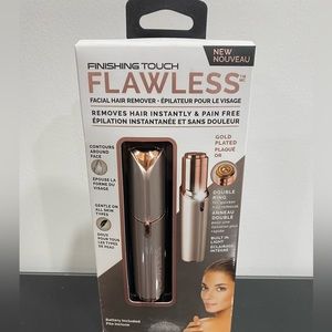 Brand new unopened Finishing Touch Flawless
Facial Hair Remover